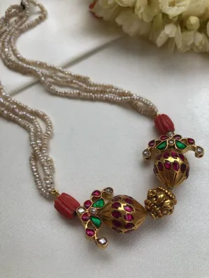 Antique style pearls with kundan beads and coral pendant with pearls necklace
